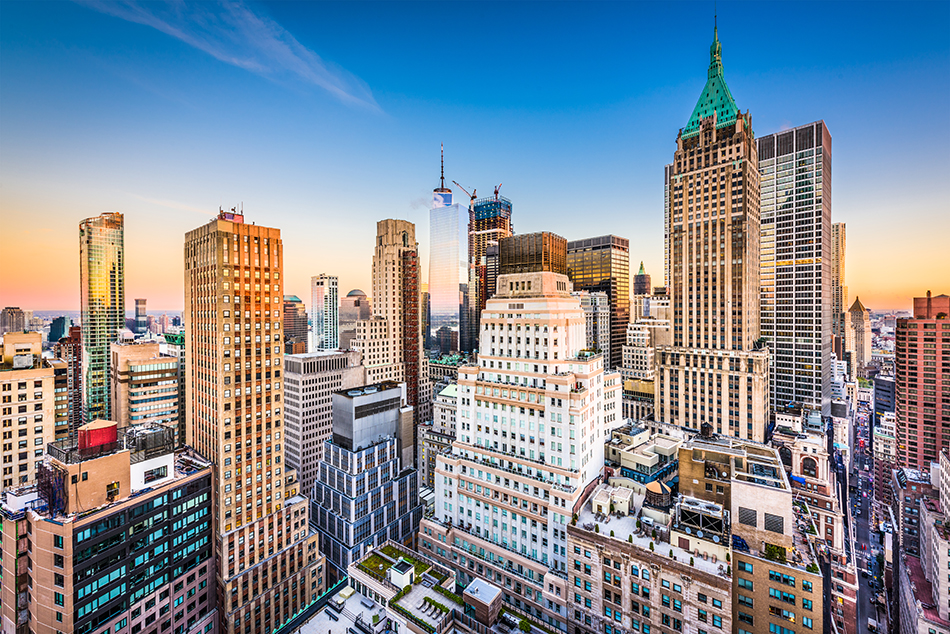 New York City Financial District cityscape at dusk.