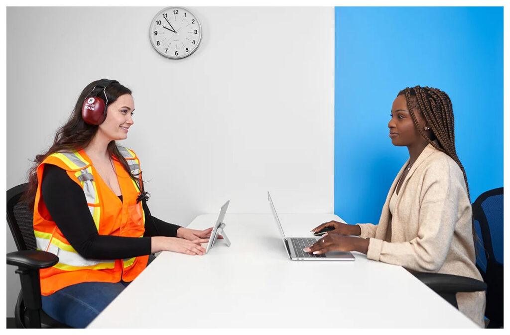 Worker being screened as part of an occupational hearing testing program